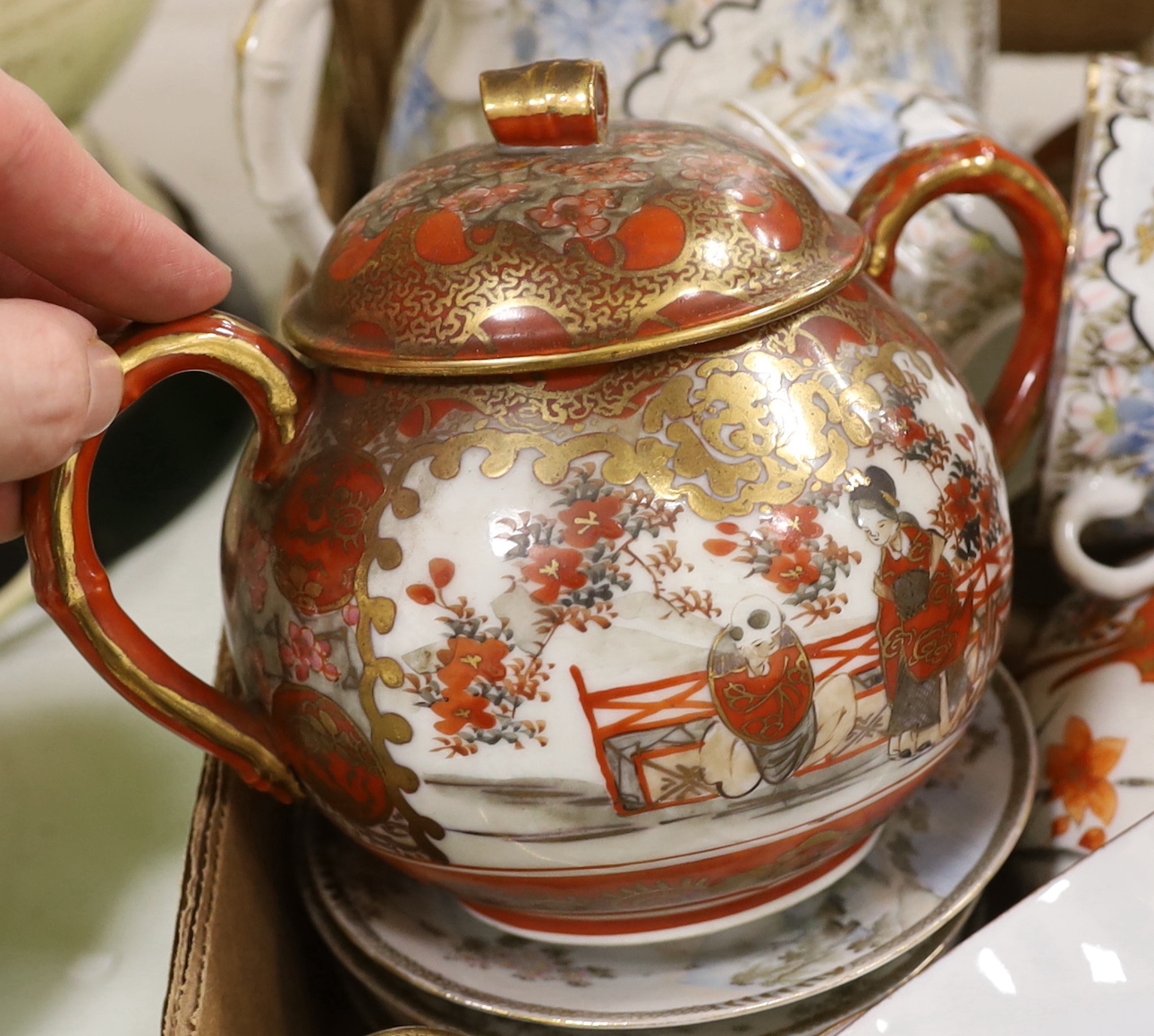 A group of Japanese ceramics, possibly Meiji including a teapot, a miniature Kutani vase and Japanese fluted bowls, etc., largest 21cm in diameter, a Japanese Satsuma lamp base and a pot and cover, possibly Meiji period,